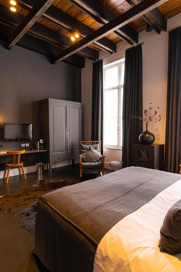فندق هيت أريسثيس رورموند المظهر الخارجي الصورة A bedroom