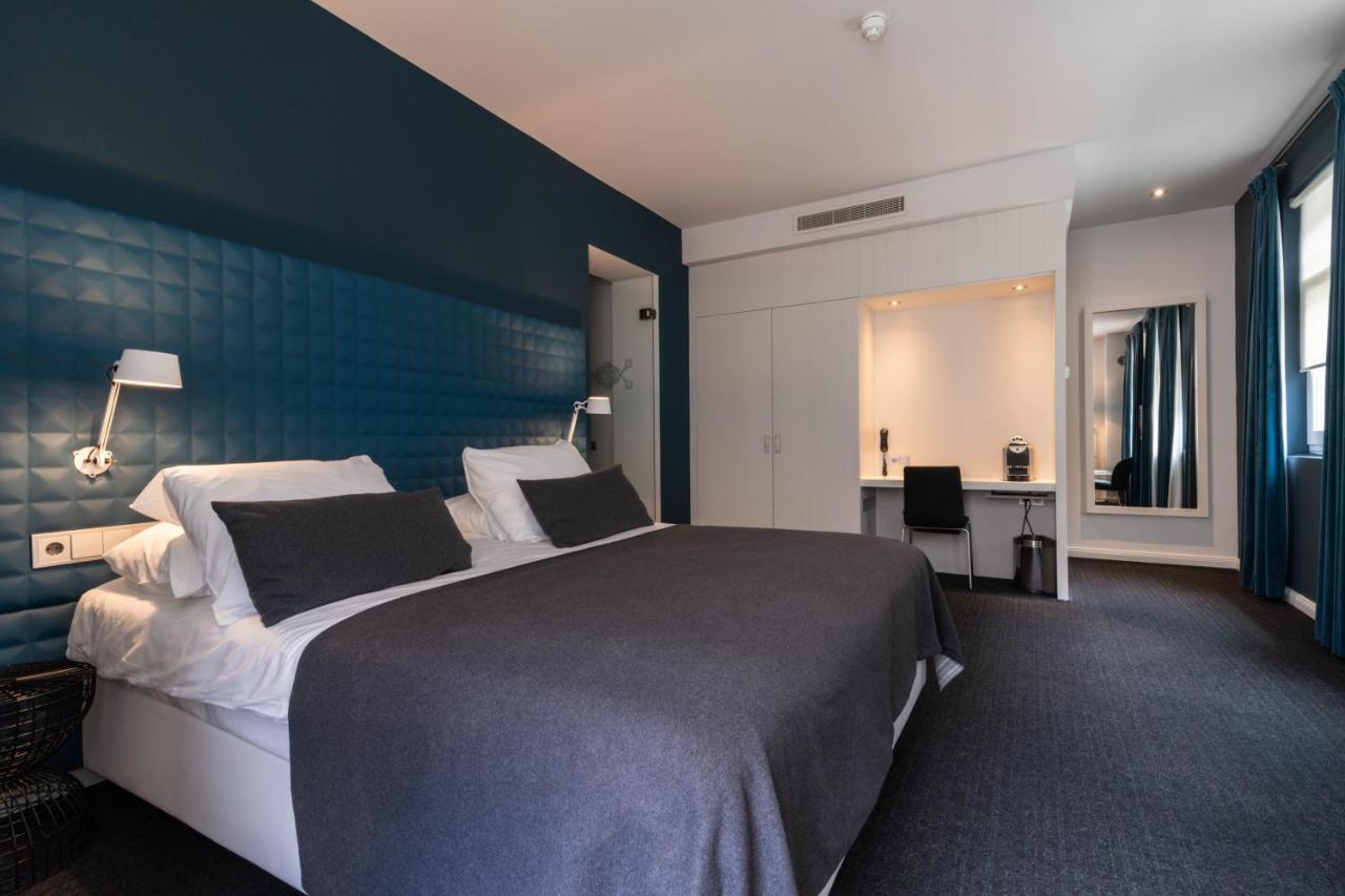 فندق هيت أريسثيس رورموند المظهر الخارجي الصورة A room at the hotel