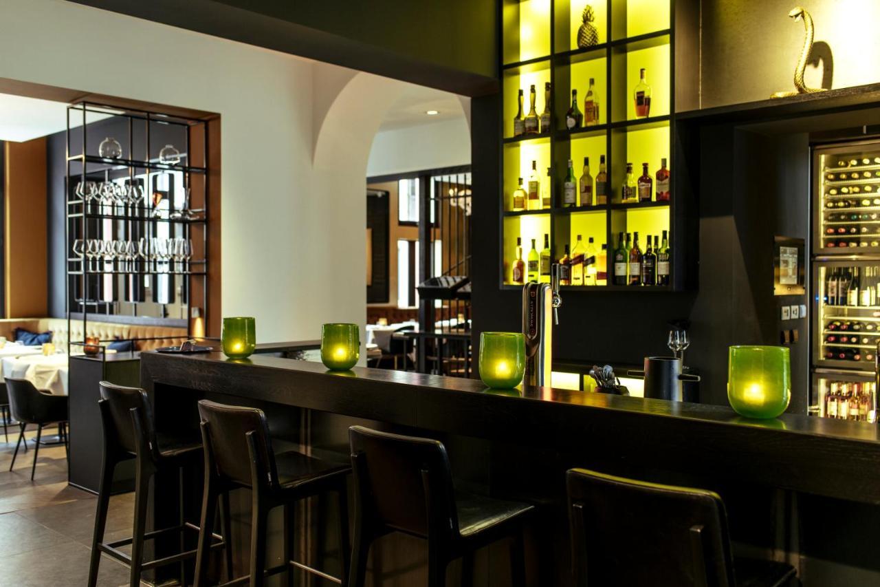 فندق هيت أريسثيس رورموند المظهر الخارجي الصورة The bar at the restaurant