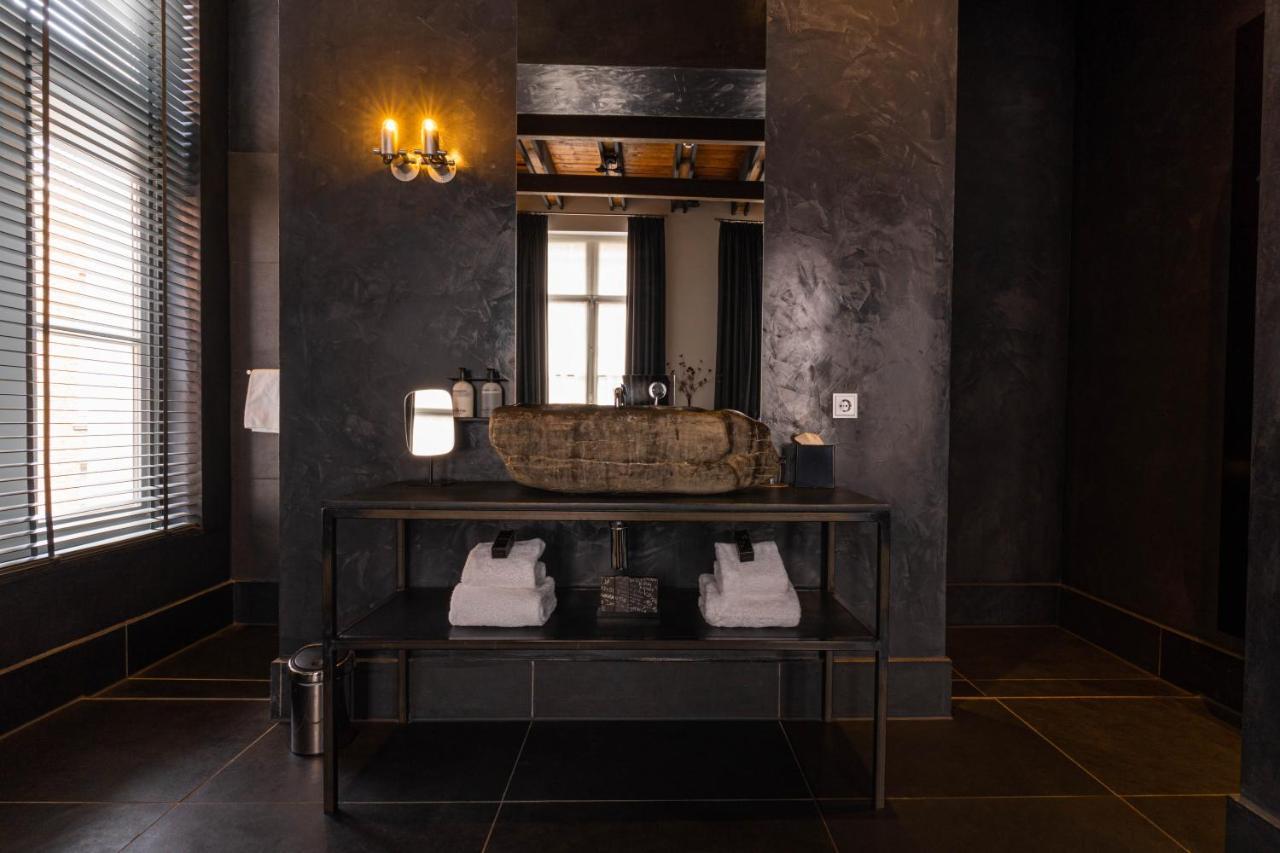 فندق هيت أريسثيس رورموند المظهر الخارجي الصورة Bathroom at the Hotel
