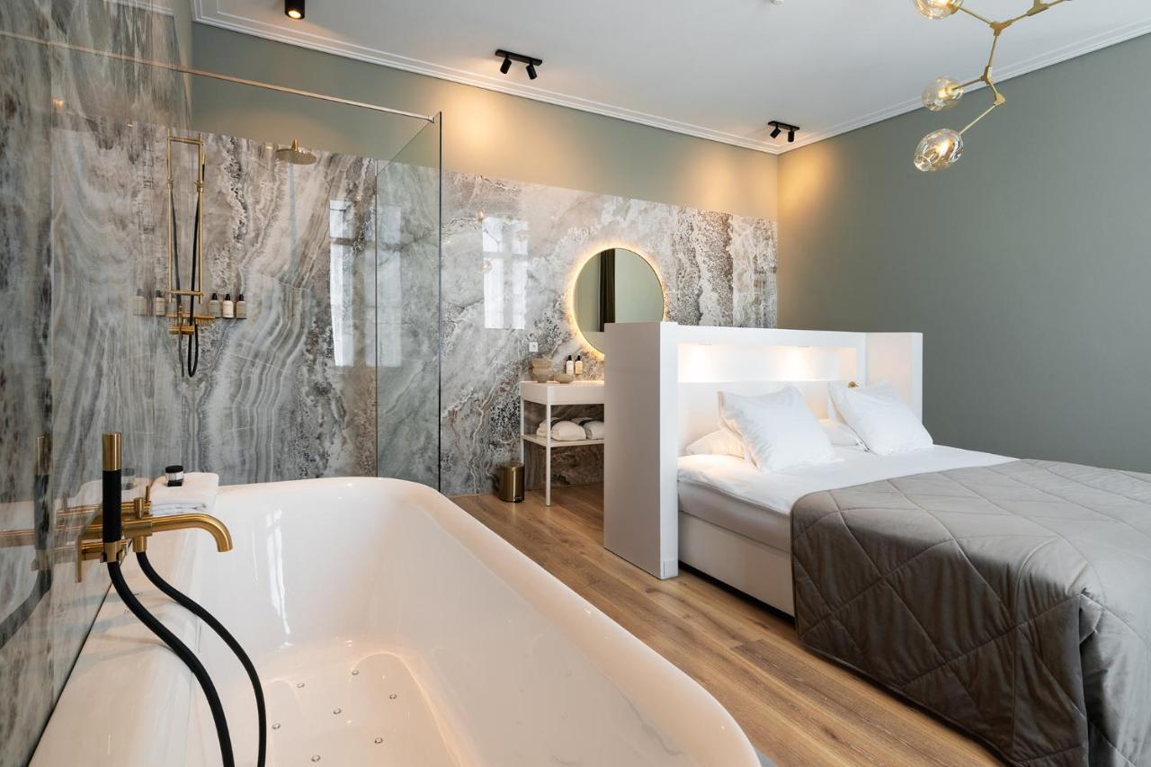 فندق هيت أريسثيس رورموند المظهر الخارجي الصورة A room at the hotel