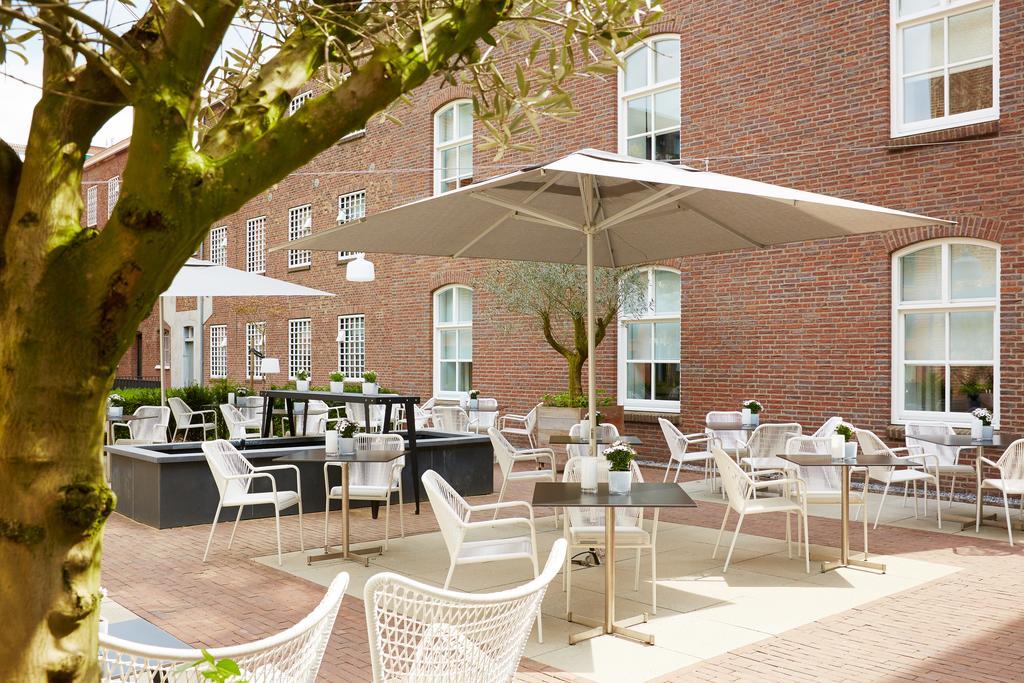 فندق هيت أريسثيس رورموند المظهر الخارجي الصورة The courtyard at the hotel