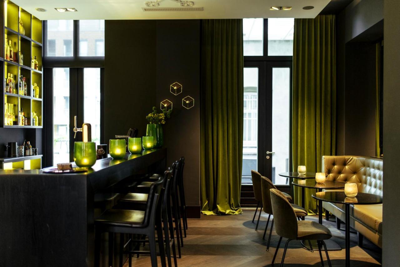 فندق هيت أريسثيس رورموند المظهر الخارجي الصورة The bar at the Hotel 87